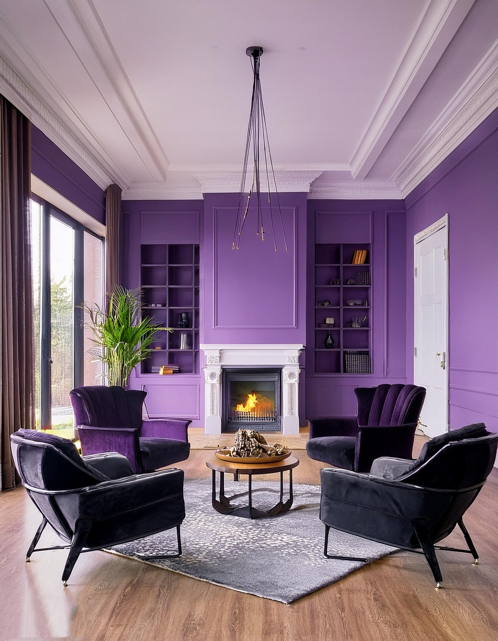 Fireplace And Black Armchairs With Wood