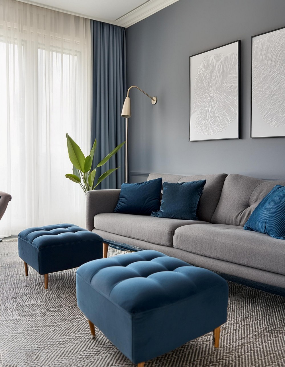 Gray Tufted Sofa with Blue Ottomans